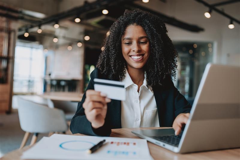 Woman holding credit card